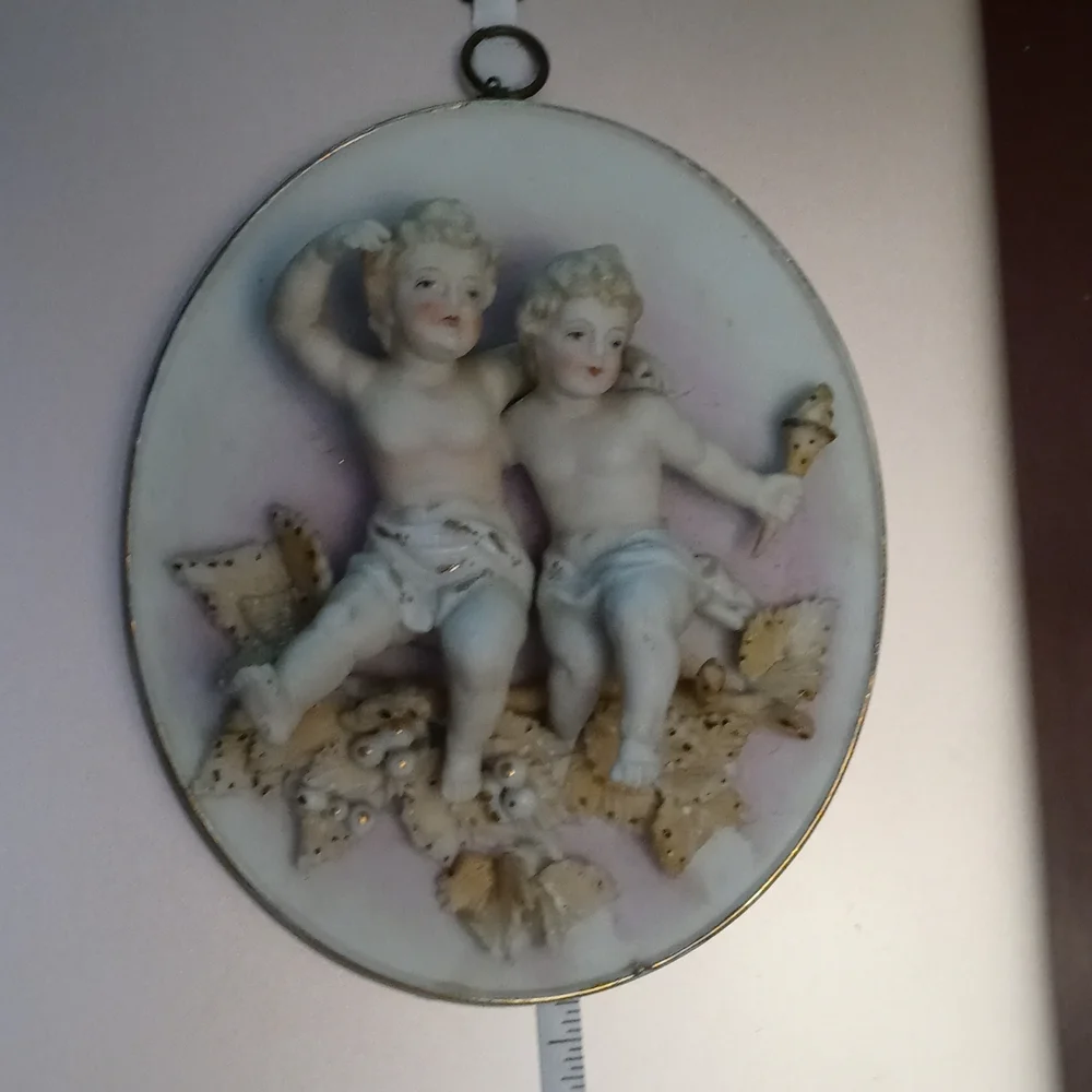 Antique cherub wall plaque